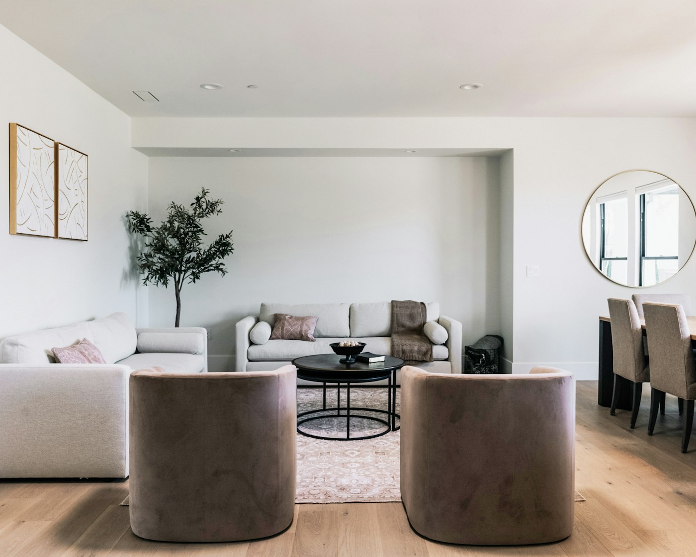 A real, softly lit living room with neutral furniture and home decor.